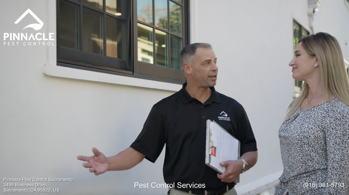 pest control worker and client