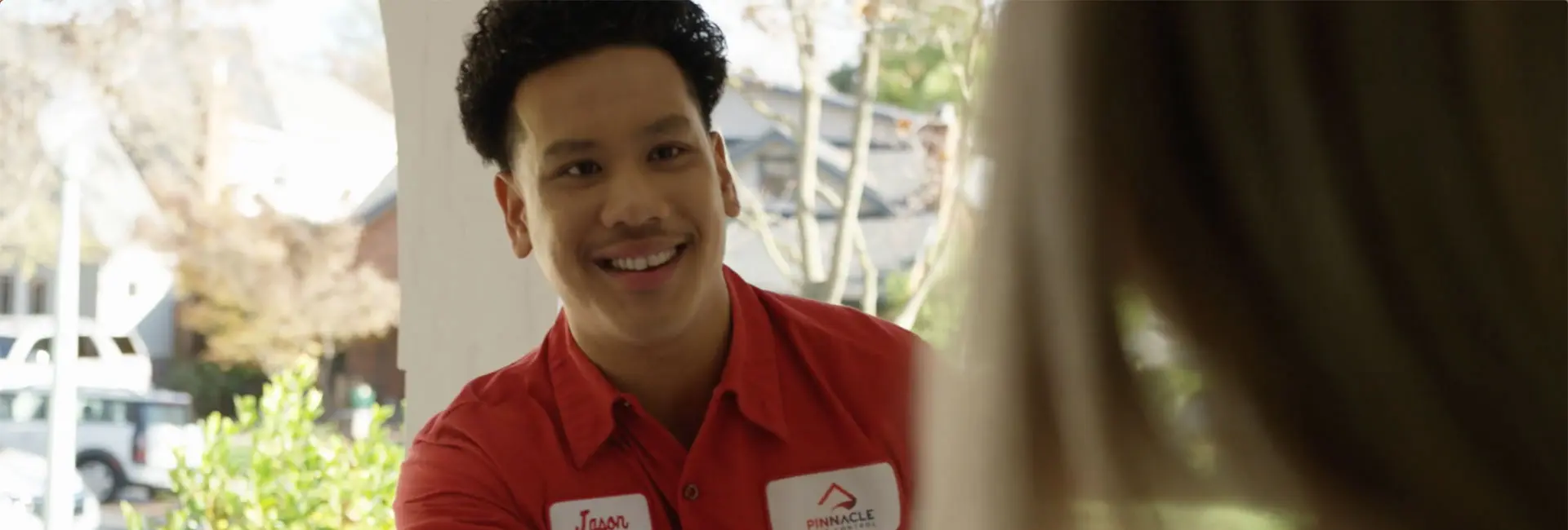 Pinnacle Pest Control technician with Sacramento customer